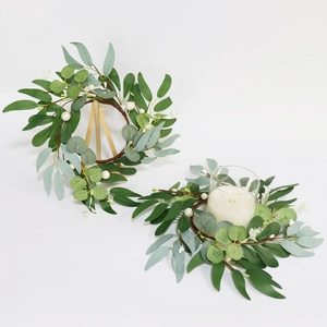 Detail of 30cm faux eucalyptus and willow leaf candle ring with elegant white pearls