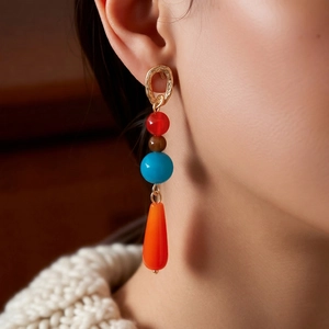 Ethnic bohemian drop earrings with multicolor agate beads and orange teardrop pendant