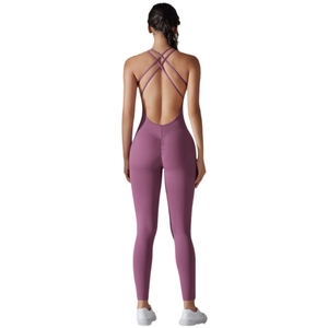 Purple backless yoga jumpsuit with ruched peach lift design and cross-back straps