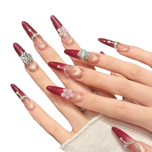 Dark red cat eye stiletto press-on nails with 3D floral and rhinestone decoration