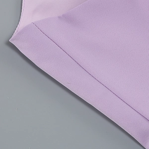 Close-up of lavender twill fabric showing detailed weave texture and high-quality stitching