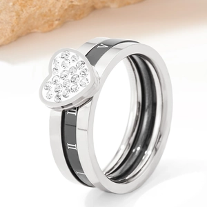 Two-tone silver and black heart ring with Roman numerals and sparkling diamonds