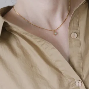 Minimalist 18K gold-plated titanium necklace with round green aventurine stone pendant