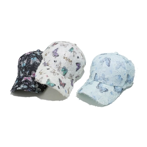 Set of three lace butterfly baseball caps in black, white and blue with frayed edges
