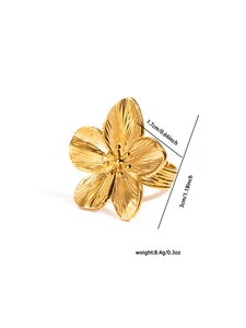 Detailed view of a gold floral titanium ring showing dimensions and brushed metal texture