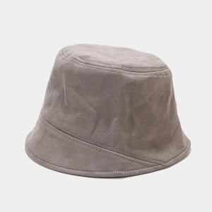 Detail shot of the suede bucket hat fabric texture and fine stitching on the grey brim