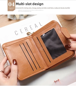 Brown leather wallet detail showing multiple card slots and transparent ID window
