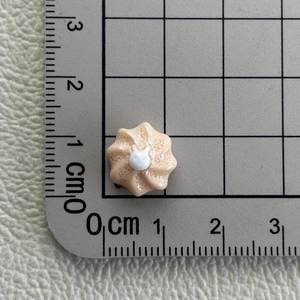 Detailed view of a 1.3cm miniature resin flower accessory with a rabbit head for DIY crafts