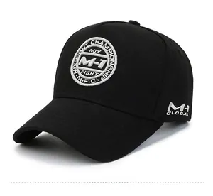 Detail view of black cotton baseball cap with M-1 FIGHT embroidered badge and logo
