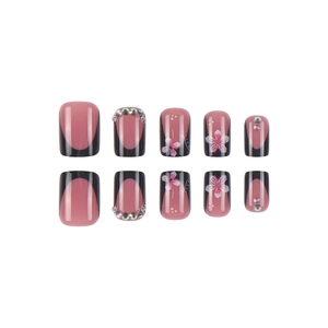 Pink French press-on nails with black tips and floral rhinestone details, square shape