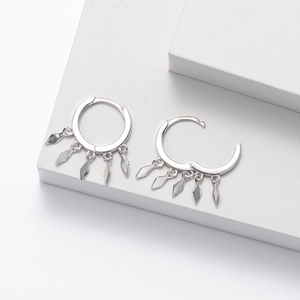 Detailed close-up of S925 sterling silver hoop earrings with five diamond-shaped fringe charms