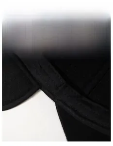 Detail of widened sweatband in black winter hat featuring moisture-wicking knit fabric