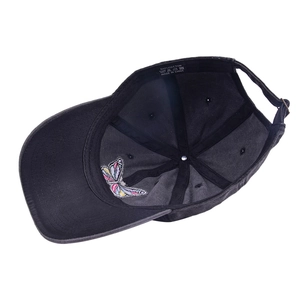 Washed black cotton baseball cap with colorful butterfly embroidery and adjustable strap