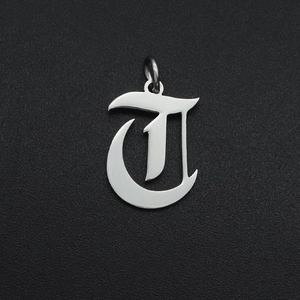 Detailed view of silver gothic letter T pendant in hollow stainless steel for DIY jewelry