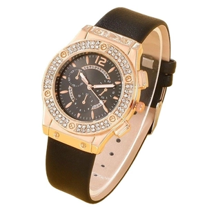 Fashion women's rose gold watch with rhinestone bezel and black leather strap on white background