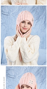 Detail of pink knitted beanie featuring cable stitch texture and a square fabric label