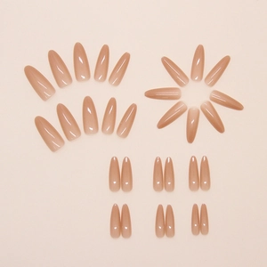 Detailed view of nude glossy stiletto press-on nails in various sizes for women