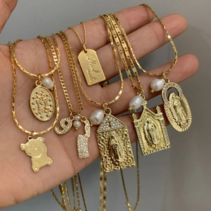 Religious Virgin Mary pendant necklace with colorful cubic zirconia and pearl charms