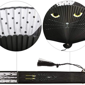 Japanese style black folding fan with white polka dots, cat face pattern and tassels