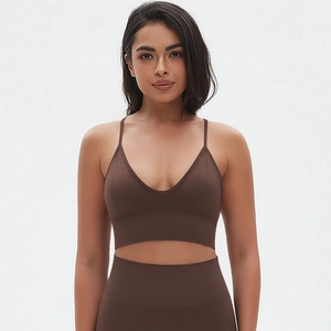 Close-up of chocolate brown seamless yoga set with ribbed support and high-waist leggings