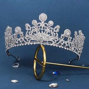 Macro shot of sparkling rhinestones and silver alloy base on a Baroque bridal crown