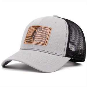 Detail of grey trucker hat featuring a leather patch with a lineman and US flag design