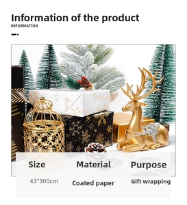 Detail of premium black and gold Christmas gift wrap featuring snowflake patterns and gold foil