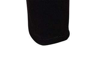 Detail of neatly stitched hem and durable fabric on men's black business trousers