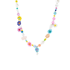 Close-up of colorful beaded choker with handmade floral accents and faux pearl details