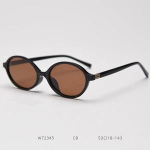 Detail view of oval polarized sunglasses with model W72345 C8 specs and tea-colored lens
