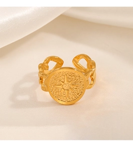 Detailed macro view of gold-plated starburst coin ring with hollow curb chain band