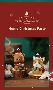 Miniature resin Christmas figurines of a festive bear and corgi on a wood tray