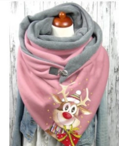 Close-up of pink and grey double-sided hooded scarf with festive Christmas reindeer print