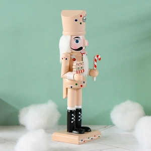 Pink gingerbread nutcracker soldier ornament 25cm on marble surface for Xmas decor