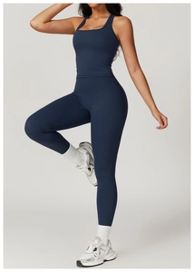 Detail of dark blue yoga set with square neck racerback top and high waist leggings