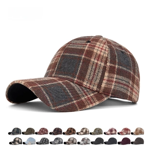 Classic plaid baseball cap for men and women with structured crown and wool-like texture