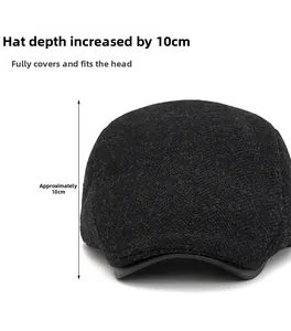 Detail of herringbone wool newsboy cap showing a deep 10cm crown for full head coverage