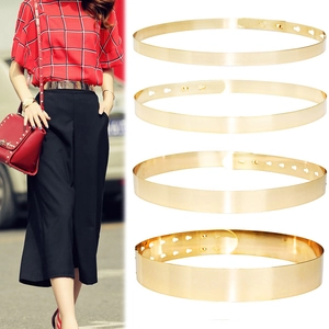 Golden mirror metal waist belt for dresses in four widths shown on model and product display