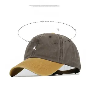 Detail view of cotton baseball cap with X embroidery showing dimensions and 7cm wide brim
