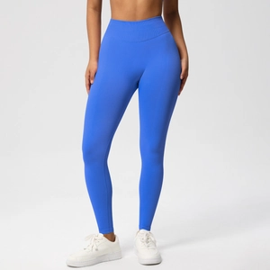 Close-up of high-waisted wide compression waistband on royal blue seamless yoga leggings