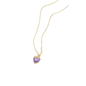 Minimalist gold necklace with a vibrant purple heart-shaped zircon pendant on white backdrop