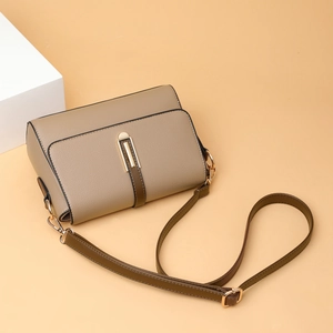 Chic khaki faux leather square crossbody bag with brown straps and golden hardware
