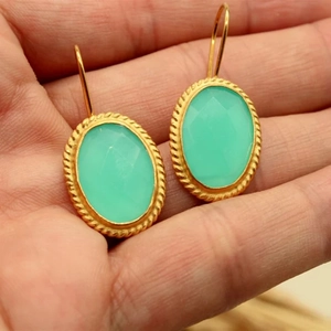 Elegant oval mint green crystal drop earrings with golden rope textured border hooks
