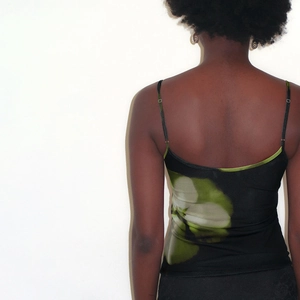 Rear view of floral camisole top showing the smooth fabric and slim fit design