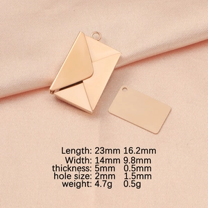 Macro detail of rose gold mirror finish envelope pendant with exact size and weight specs