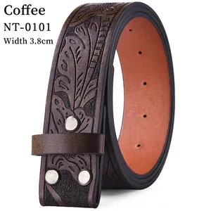 Detail of coffee brown leather belt with leaf embossing and silver rivet decorations