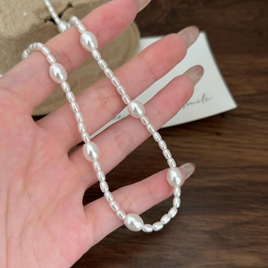Minimalist 925 sterling silver necklace with natural irregular pearls and soft luster