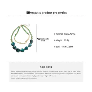 Detail view of a double-layered necklace featuring green beads and blue acrylic stones