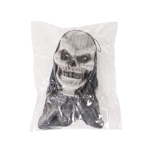 Detail of Halloween hanging ghost skull mask with grey gauze in clear plastic bag