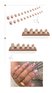 Detail of floral press-on nails with lavender flower motifs and clear base in 24 piece set